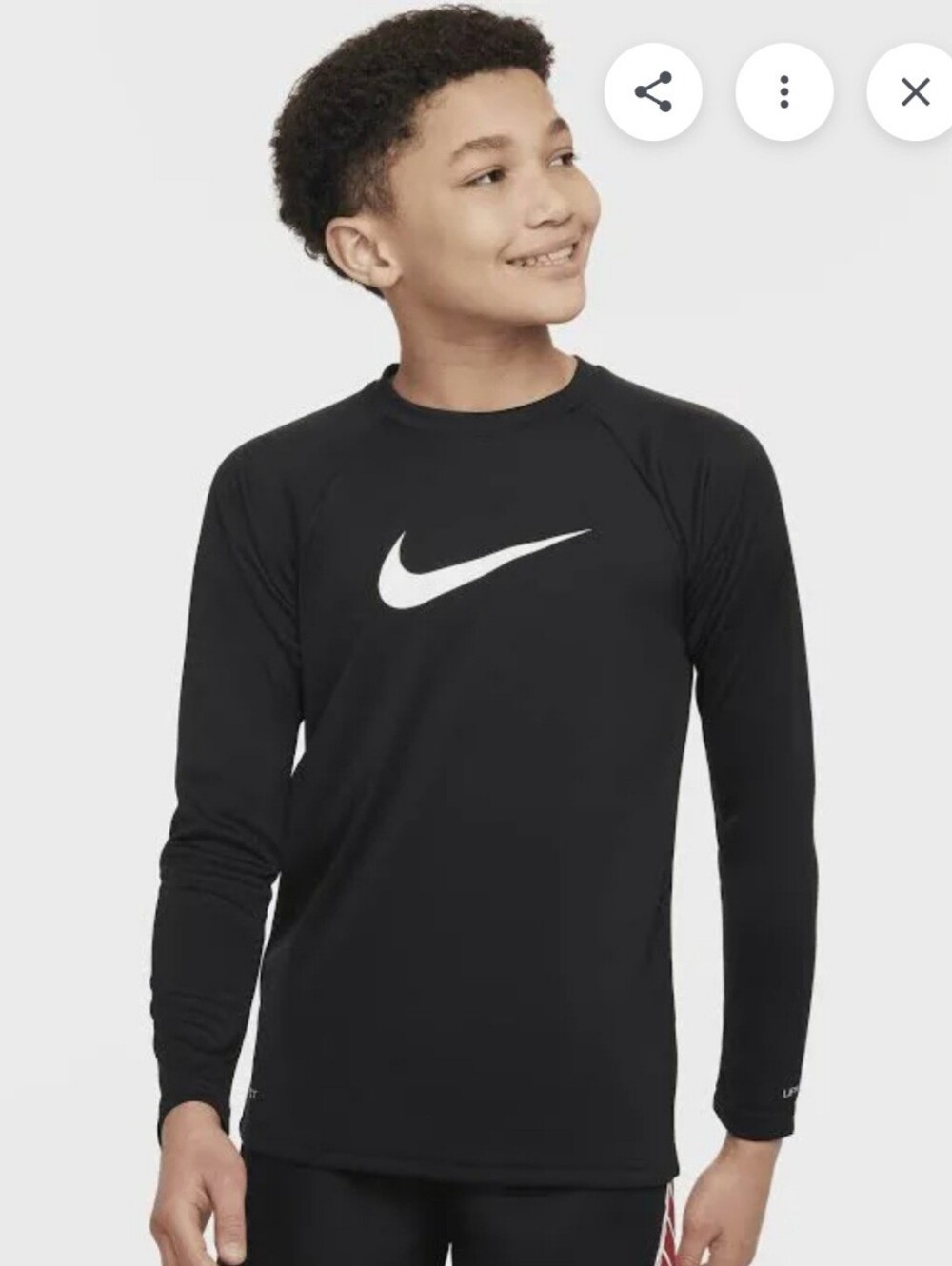 Nike Swim Dri-FIT long-sleeve Rashguard features a classic athletic crewneck
